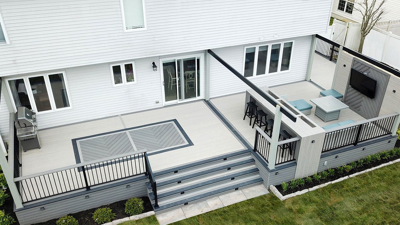Voyage Decking in Sierra and Tundra with Dark Slate and ALX Contemporary Rail in Black